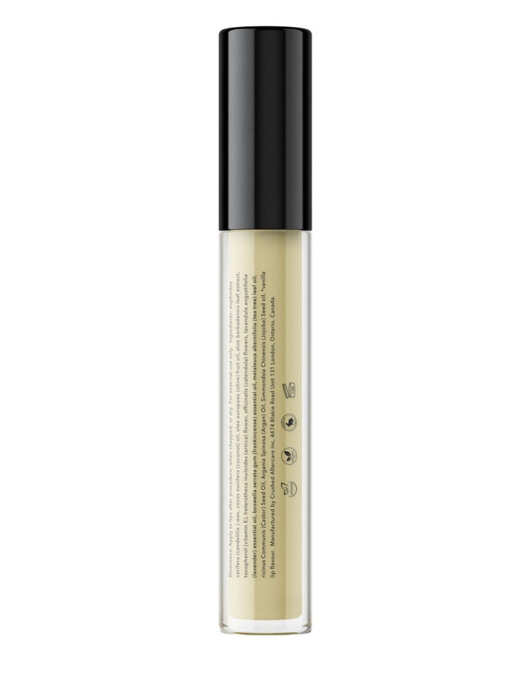 Skincare serum bottle with black cap on a white background
