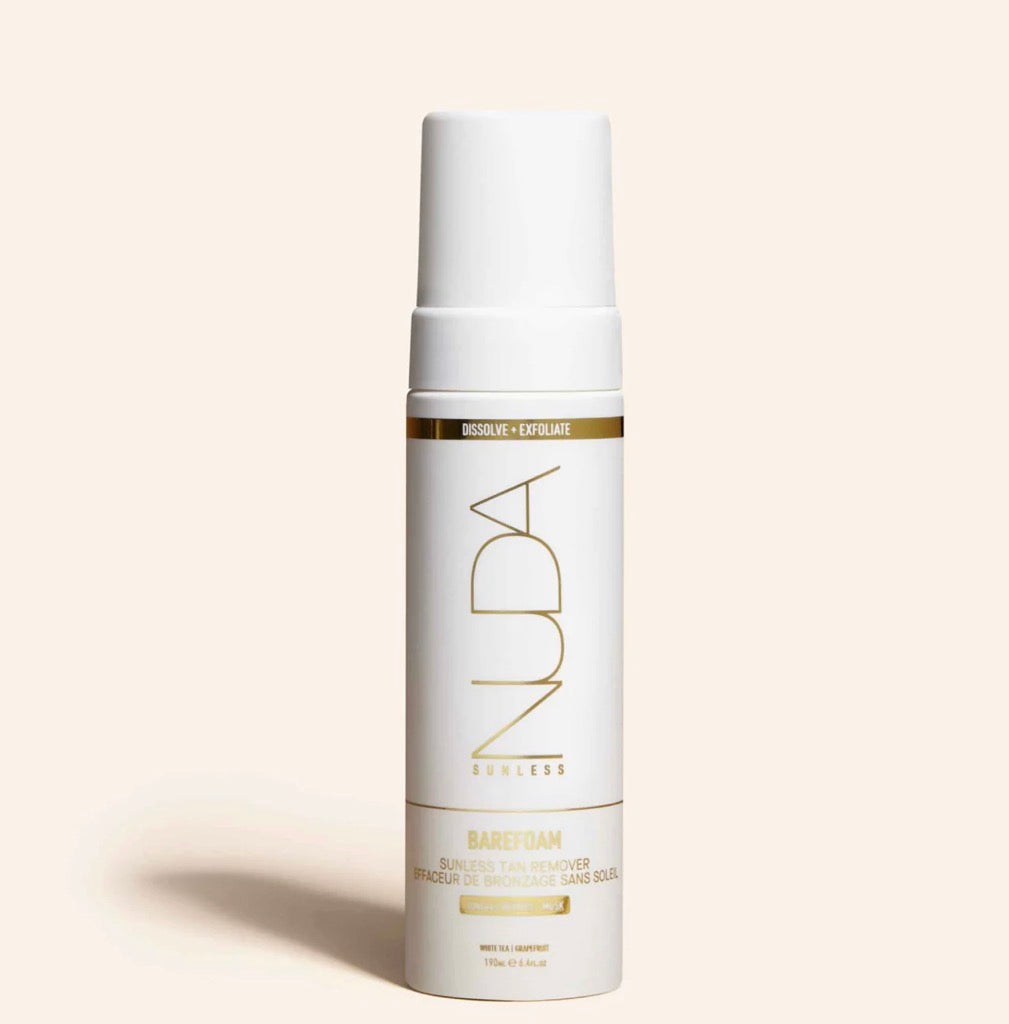 Nuda skincare bottle on a beige background