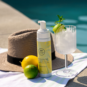 Self Tanner, hat, wine glass, lime
